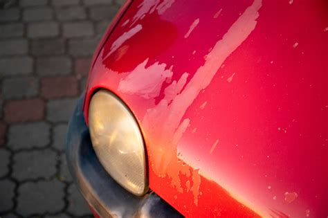 Why is my car paint peeling, and does it have anything to do with the moon's gravitational pull?